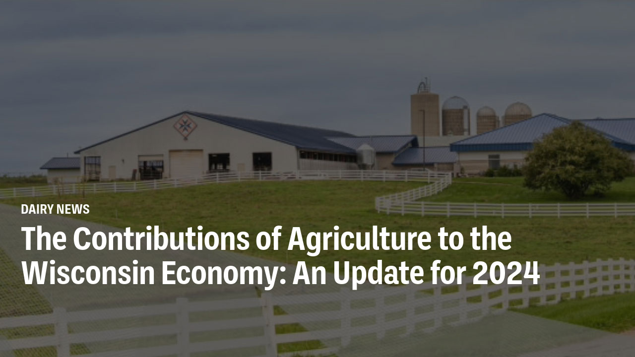 Modern dairy farm with white buildings, blue-roofed barns, grain silos, white fencing, and green pastures under a gray sky. Image accompanies an article on agriculture's contribution to the Wisconsin economy in 2024.