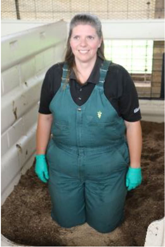 Kneeling in calf bedding surface. Photo shows how to perform impact test.